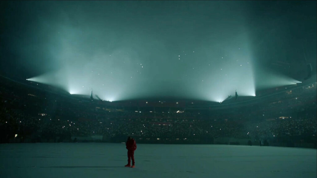 Stunning Kanye West iPhone Wallpaper: Dramatic Stadium Ambiance