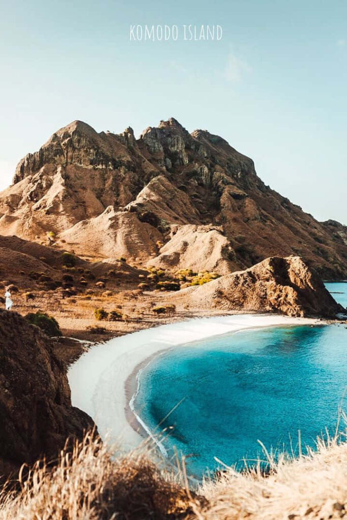 Stunning Komodo Island Landscape Wallpaper: Rugged Mountains & Turquoise Bay