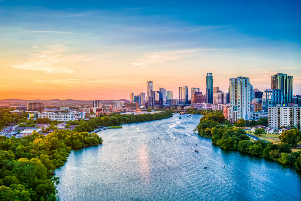 Breathtaking Austin Skyline at Sunset over Lady Bird Lake Wallpaper