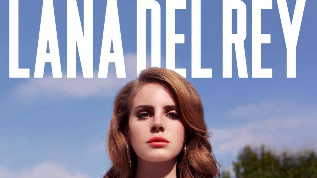 Elegant Lana Del Rey Portrait Wallpaper Against Clear Blue Sky