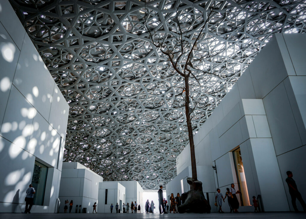 Stunning Louvre Abu Dhabi Dome: Intricate Design & Light Play Wallpaper