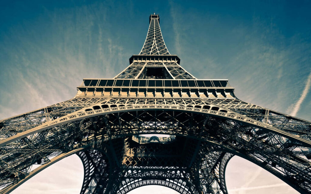 Eiffel Tower Low-Angle View: Stunning Architectural Wallpaper