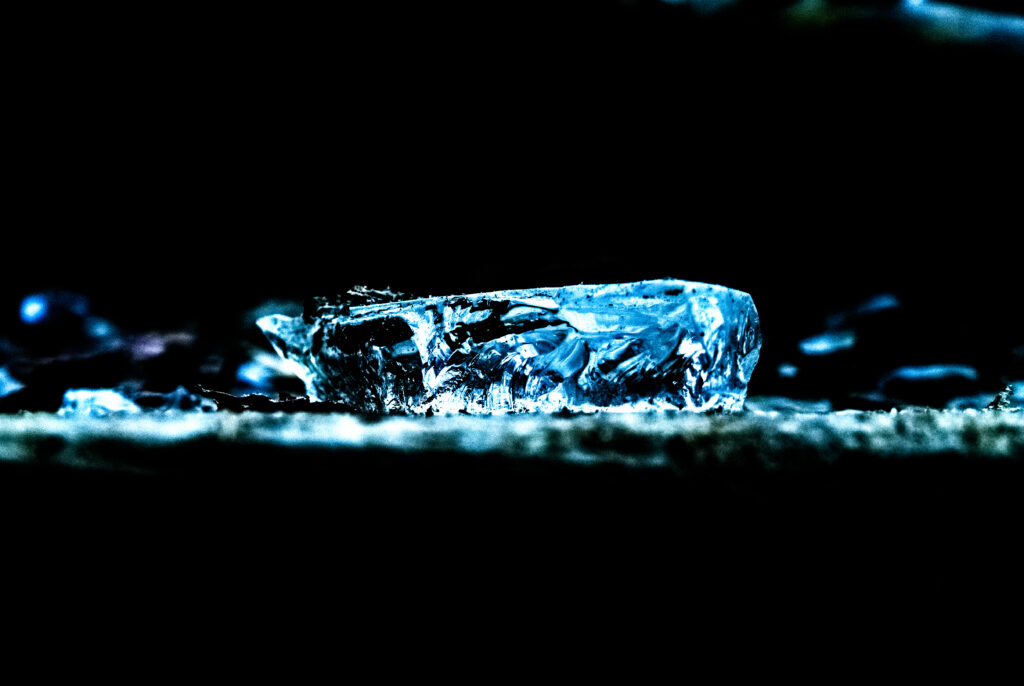 Blue Ice Crystal Macro Close-Up on Dark Background Wallpaper