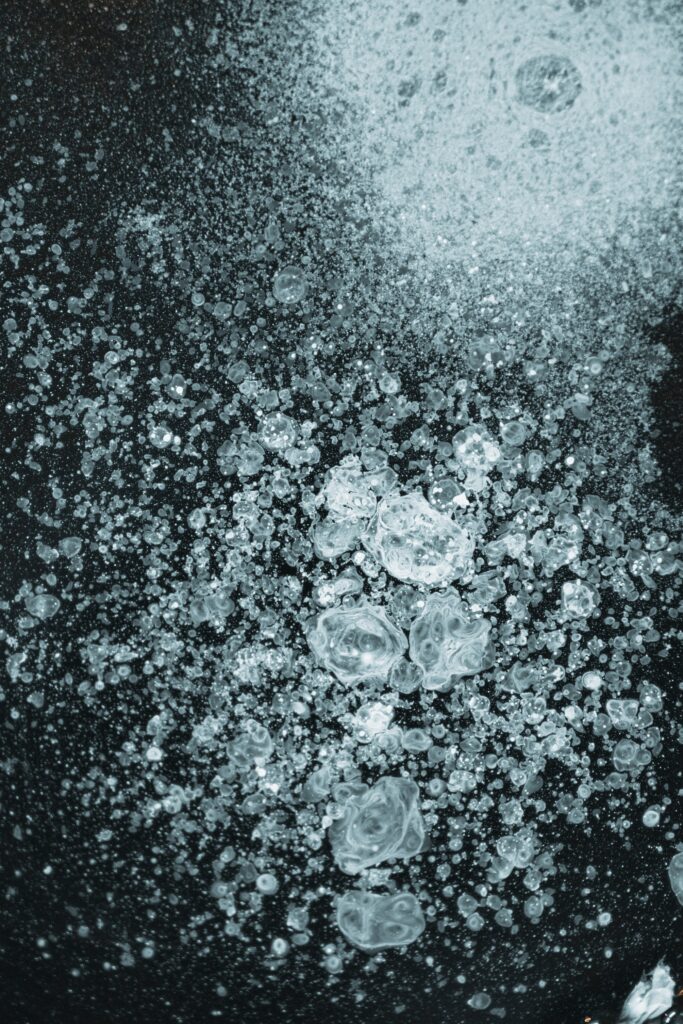 Intricate Macro Ice Shards Wallpaper Background - Textured Crystalline Design