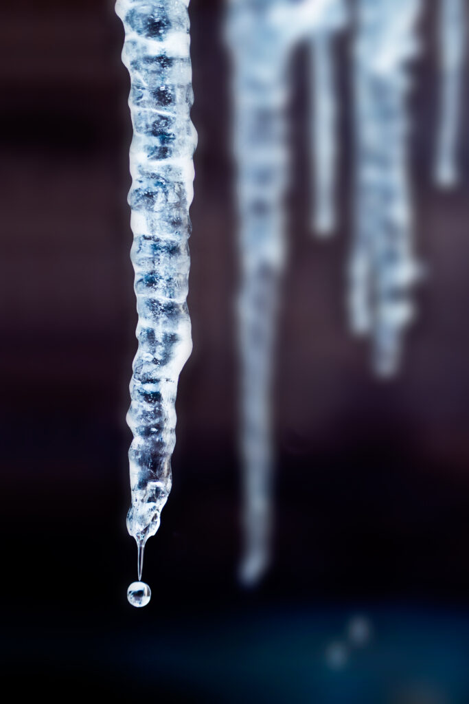 Intricate Icicle Macro Shot with Water Drop - Stunning Wallpaper