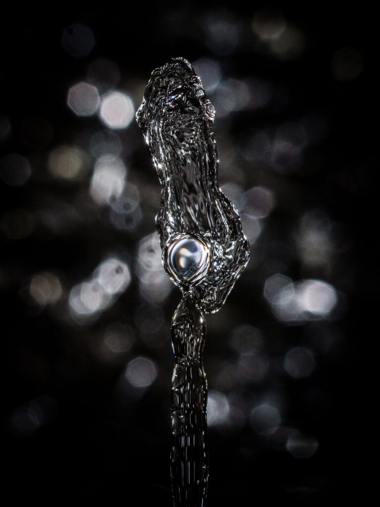 Intricate Macro Water Splash with Bubble - Stunning Wallpaper Background