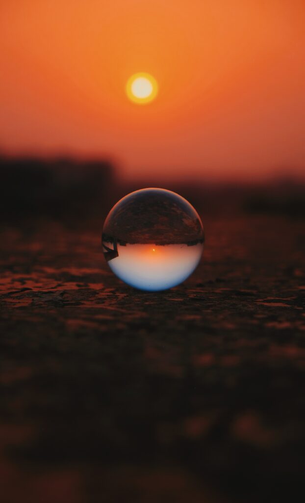 Stunning Macro Glass Ball Sunset Reflection - Captivating Wallpaper