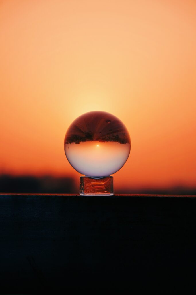 Stunning Macro Wallpaper: Glass Ball Reflecting Vibrant Sunset Colors