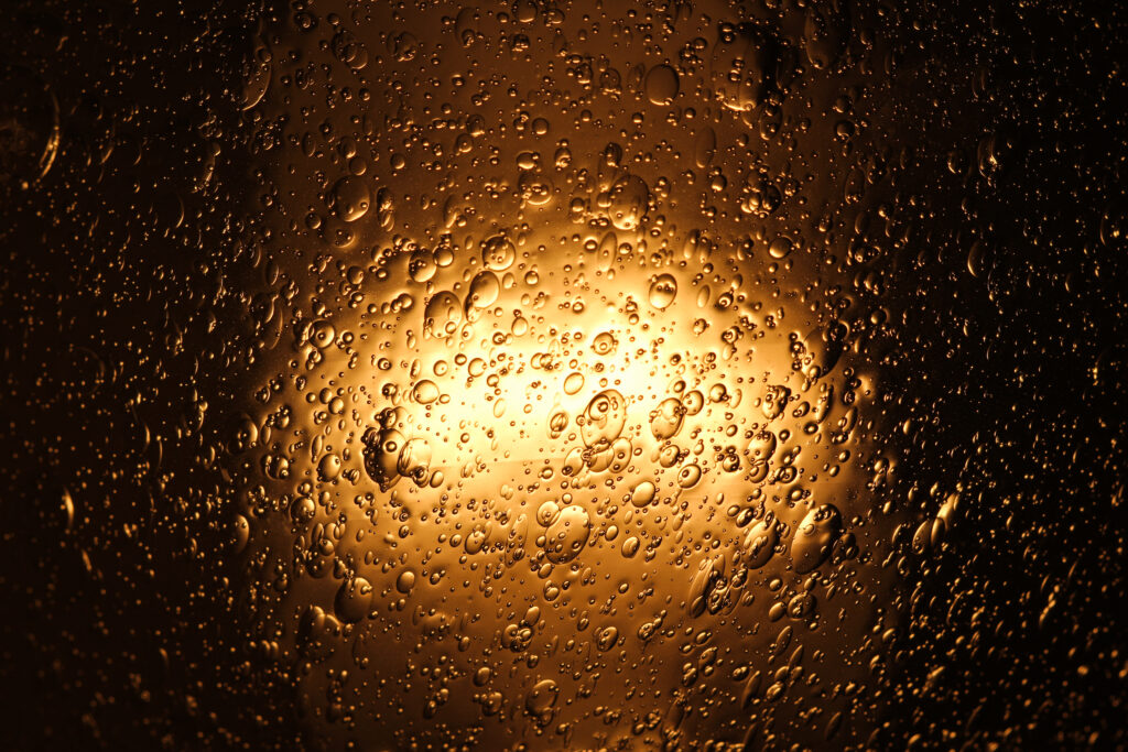 Stunning Golden Bubble Macro Wallpaper with Radiant Backlight