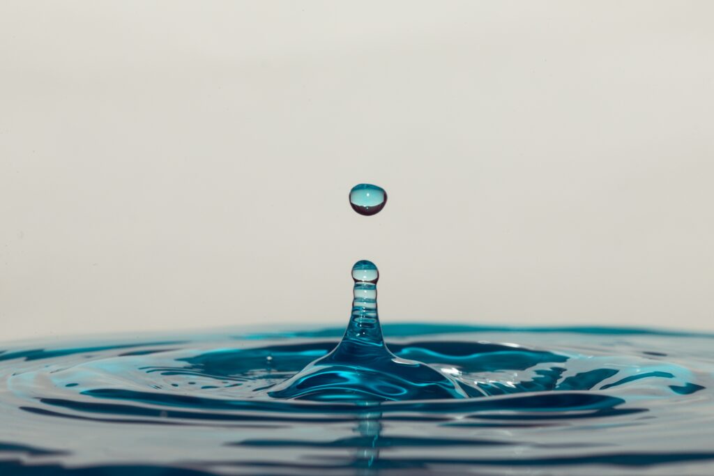 Stunning Macro Shot of Water Droplet Splash - Wallpaper Background