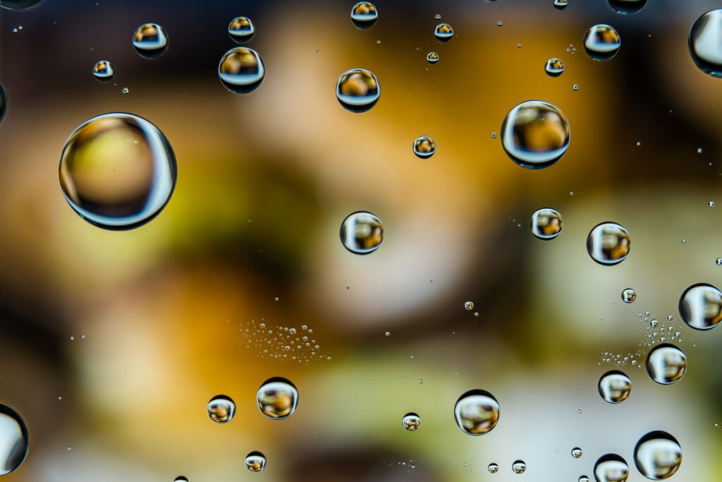 Macro Water Droplets Wallpaper: Colorful Distorted Background