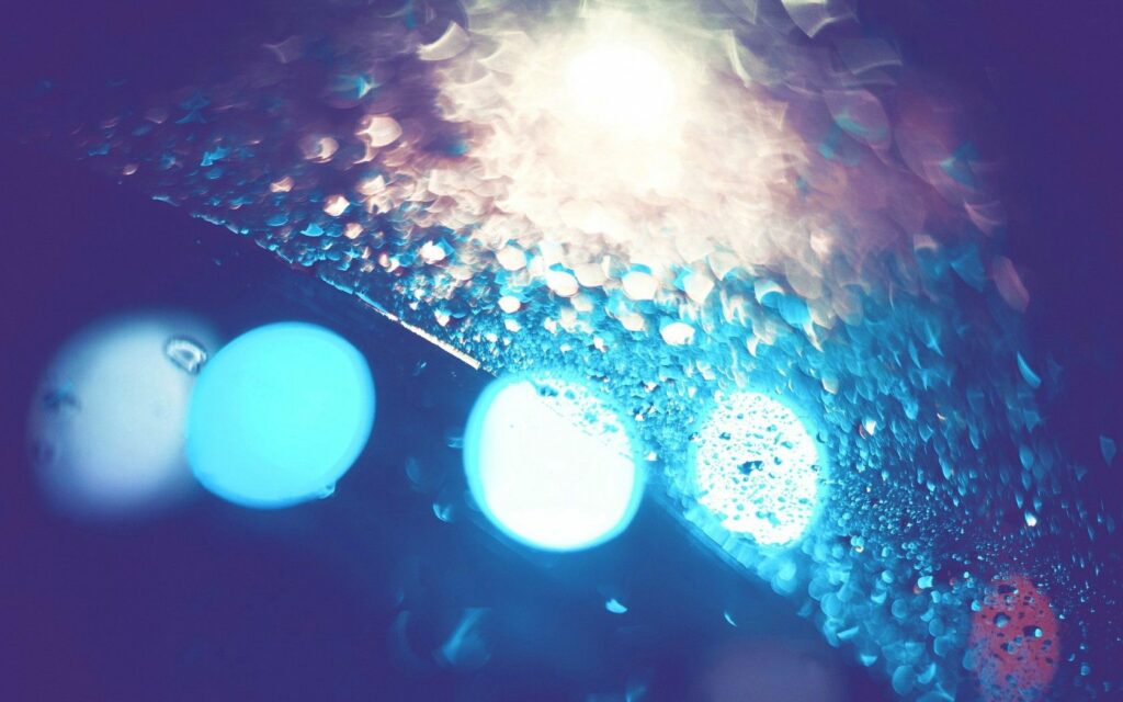 Enchanted Macro Water Droplets Wallpaper with Colorful Blurred Lights