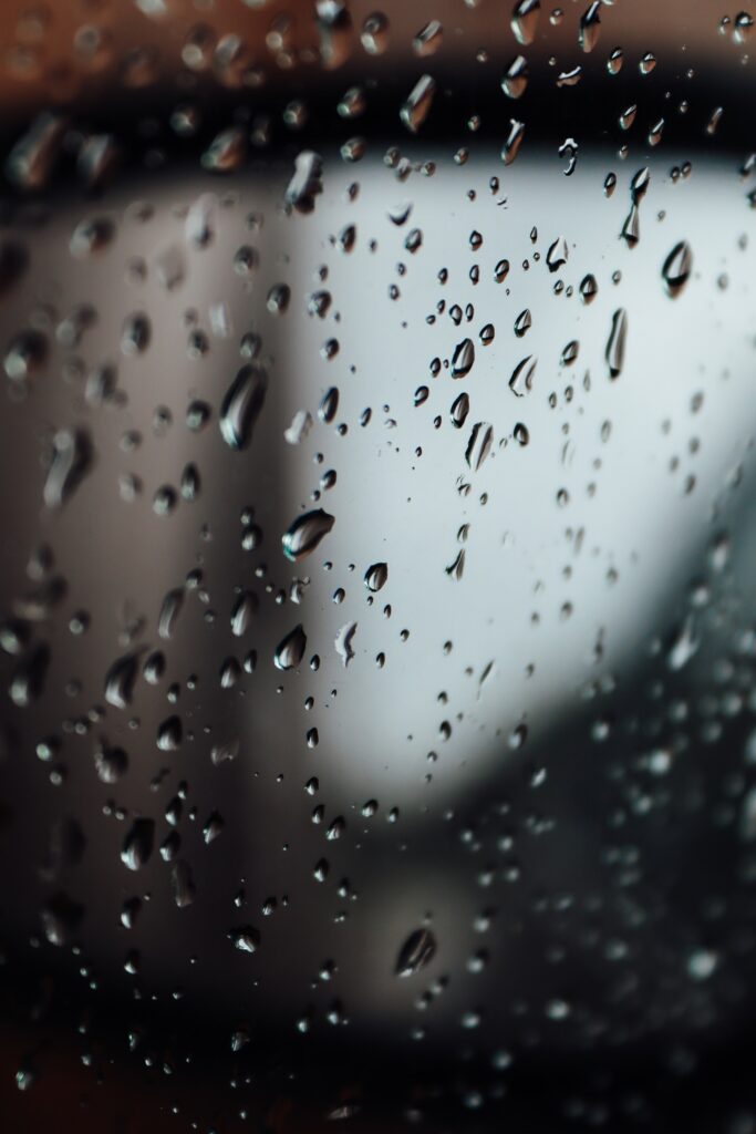 Intricate Water Droplets on Glass - Stunning Wallpaper Background