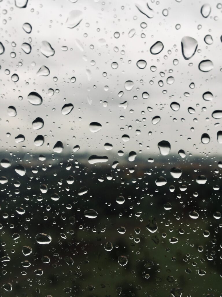 Macro Water Droplets on Glass: Stunning Outdoor Landscape Wallpaper