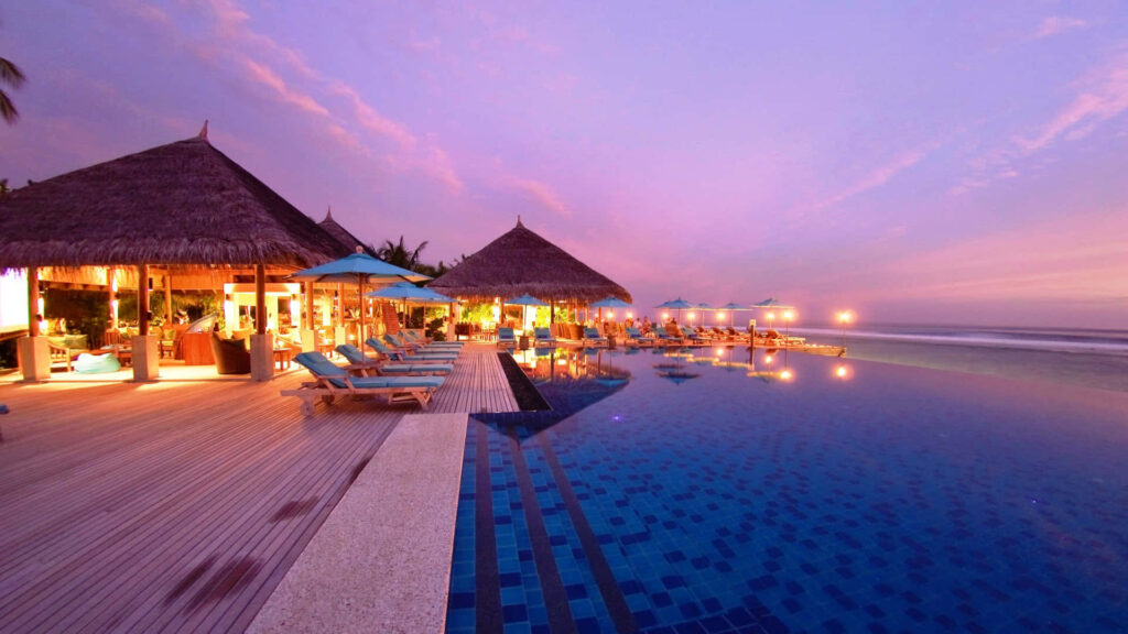 Stunning Maldives Beach Sunset Wallpaper with Overwater Bungalows