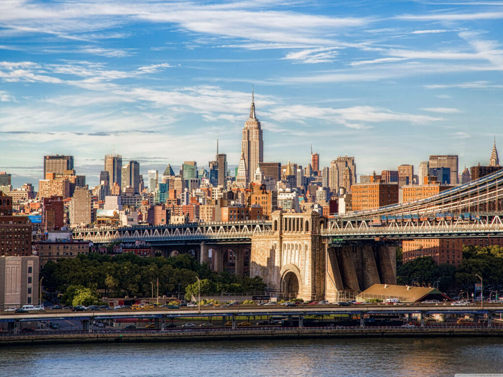 Stunning Manhattan Skyline with Brooklyn Bridge - Urban Wallpaper Background