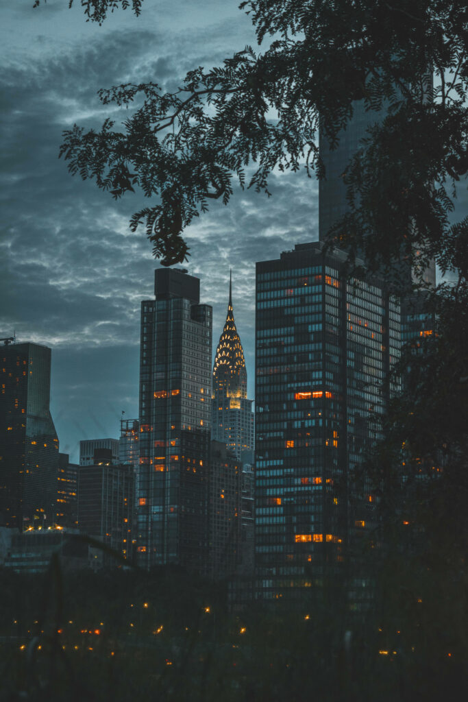 Illuminated Manhattan Skyline Wallpaper at Dusk – Stunning Background