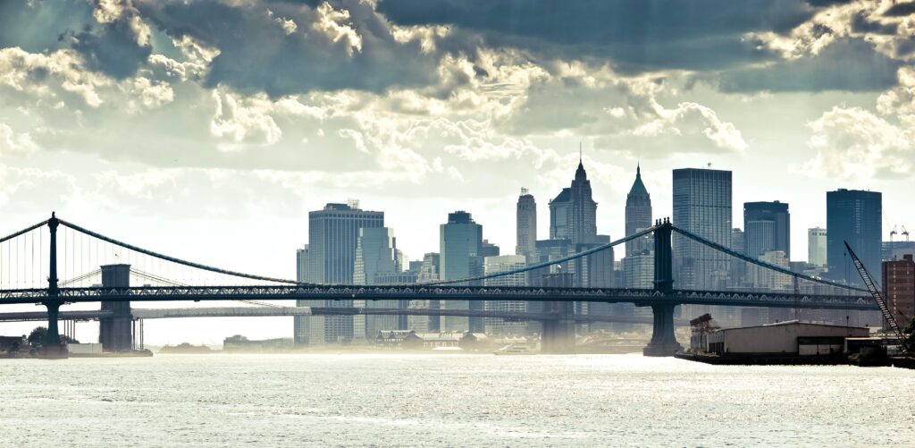 Panoramic Manhattan Wallpaper: Iconic Skyline & Majestic Bridge