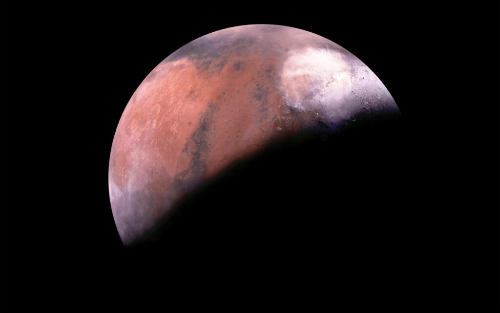 Stunning Mars Wallpaper: Illuminated Planet Against Black Space