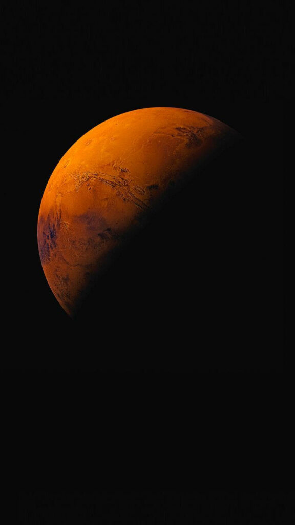 Stunning Mars Wallpaper: Vivid Reddish-Orange Against Space Blackness