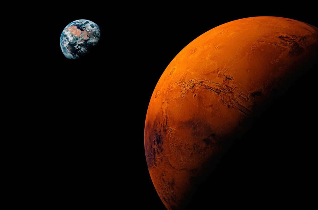 Vivid Mars Wallpaper: Red Planet with Earth in Space Background