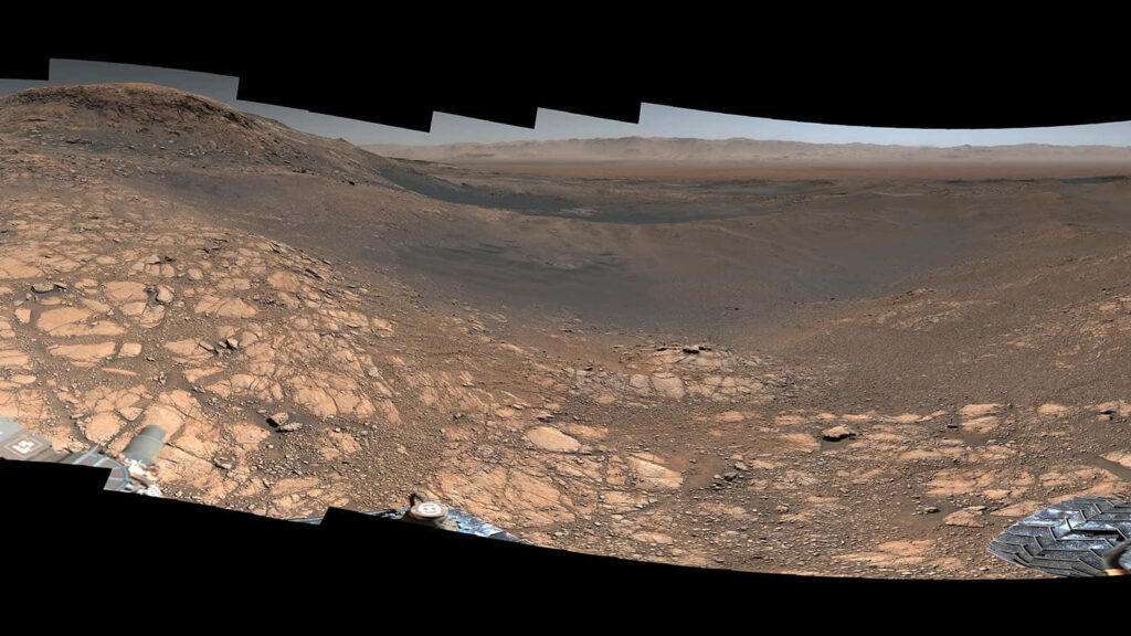 Breathtaking Martian Surface Wallpaper: Rugged Terrain & Dusty Plains