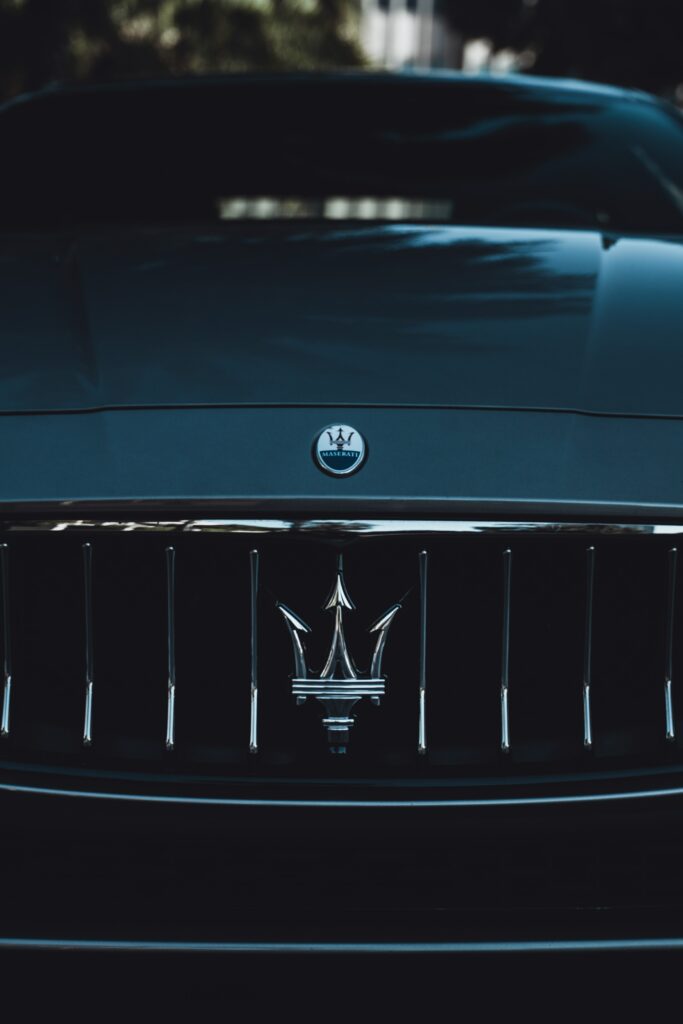 Stunning Maserati Wallpaper: Close-Up of Iconic Trident Logo