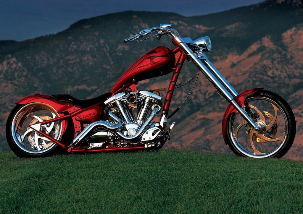 Stunning Matte Red Chopper Motorcycle Wallpaper Amidst Mountains
