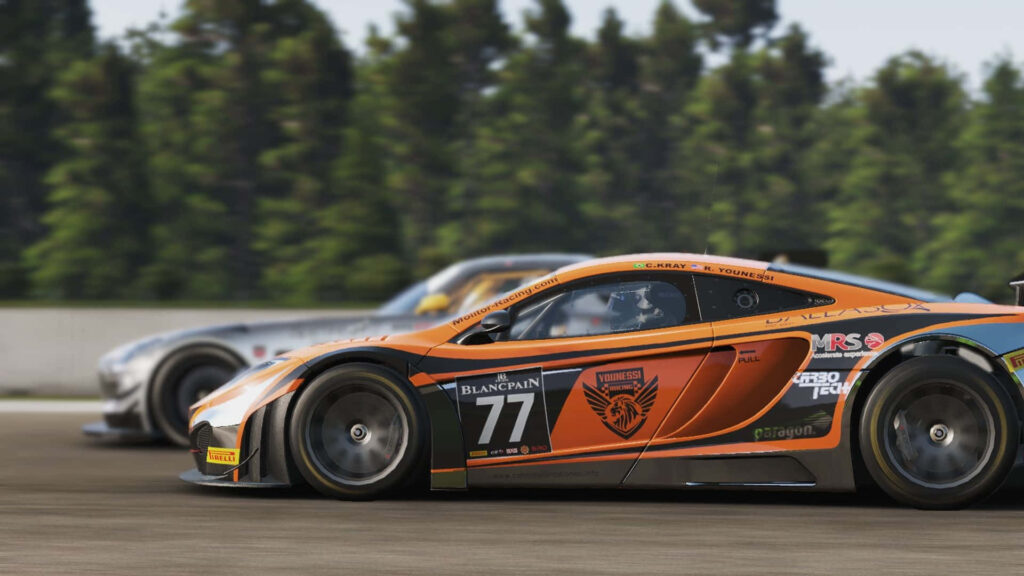 Dynamic Orange McLaren 12C Racing Car Wallpaper in Action