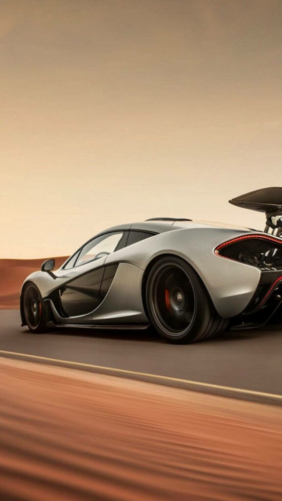 Sleek McLaren P1 Racing in Desert - Stunning Automotive Wallpaper