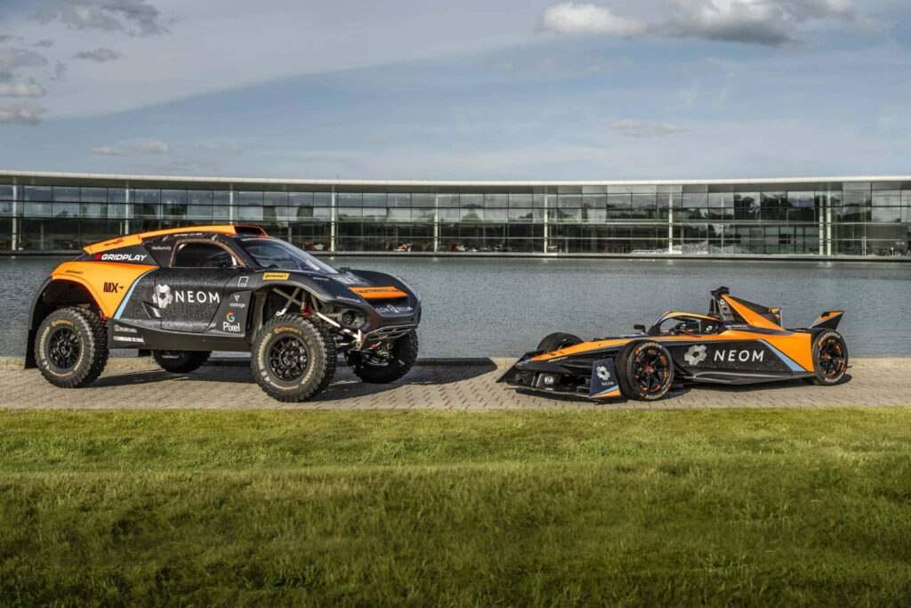 Dynamic McLaren Wallpaper: Electric Rally SUV & Formula E Car