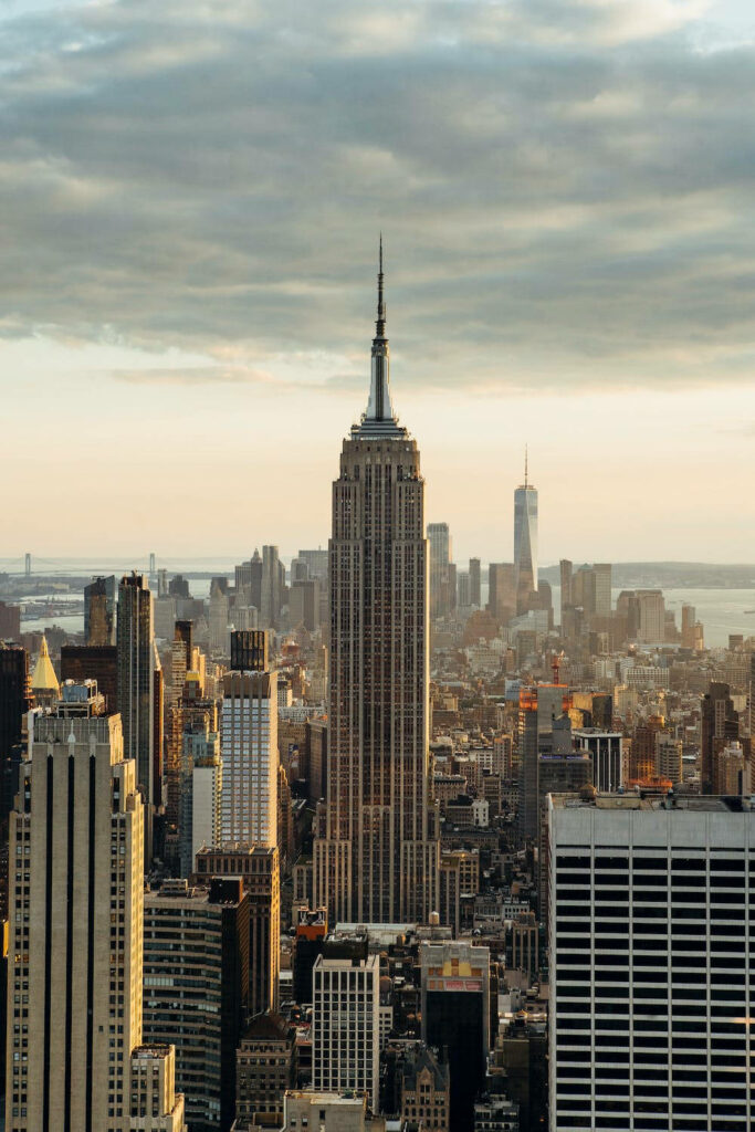 Stunning Morning Megapolis View: Iconic Skyscrapers & Warm Sunshine Wallpaper