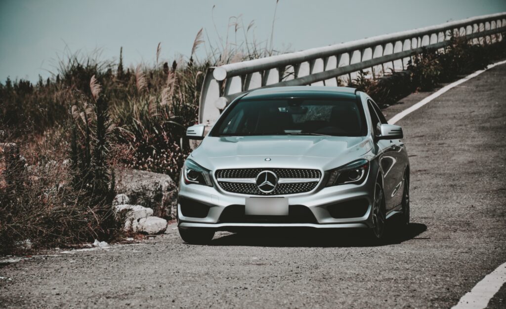 Sleek Mercedes-Benz CLA-Class Wallpaper with Scenic Outdoor View