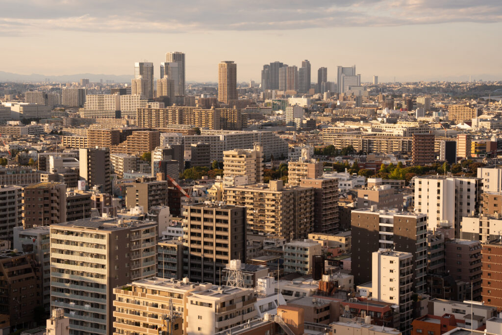 Modern Cityscape Wallpaper: Urban Architecture Under a Serene Sky