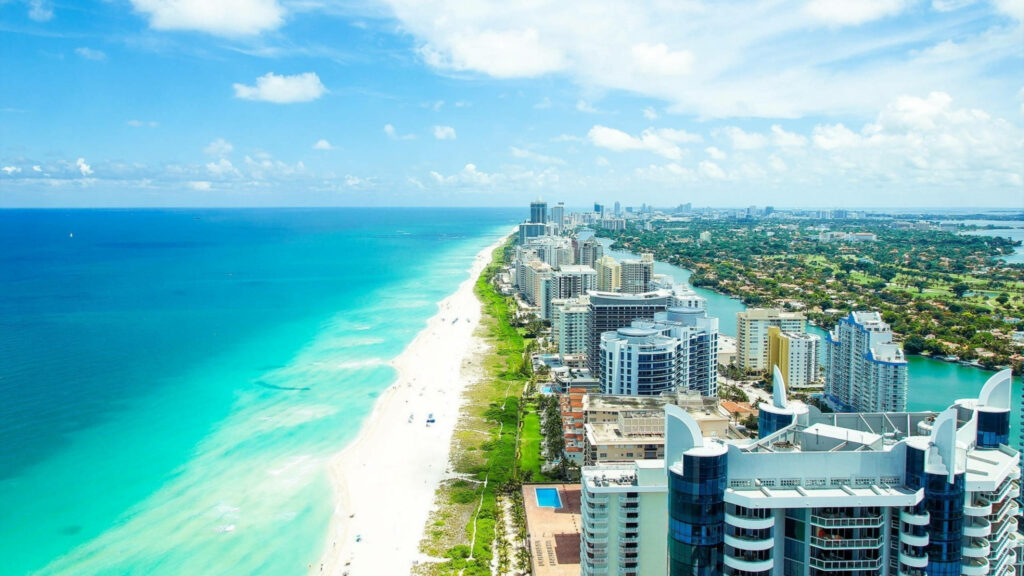 Vibrant Miami Beach Aerial View: Turquoise Waters & White Sand Wallpaper