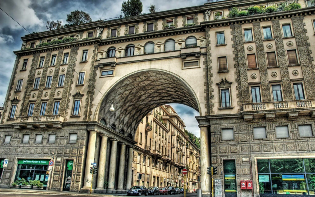 Magnificent Milan Architectural Arc Wallpaper with Lush Greenery
