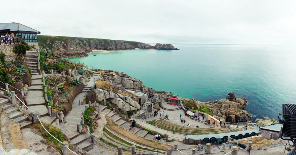 Stunning Minack Theatre View: Cliffside Open-Air Amphitheater Wallpaper
