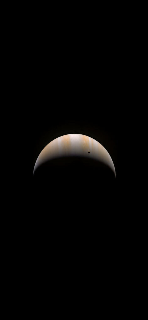 Stunning Minimalist Wallpaper: Crescent Jupiter on Dark Background