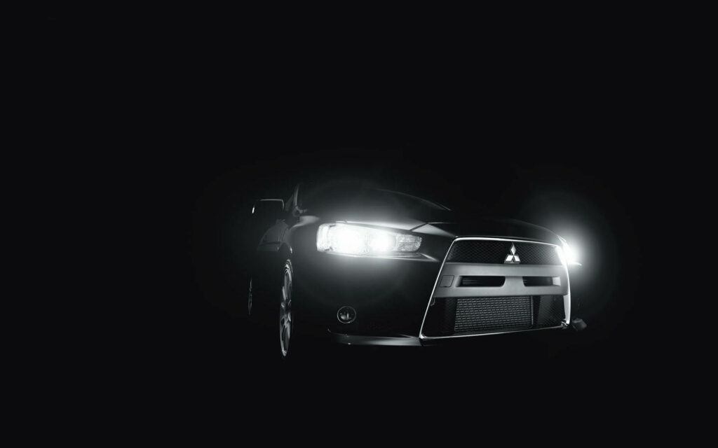 Sleek Mitsubishi Car Headlights Wallpaper: Modern Design Accent