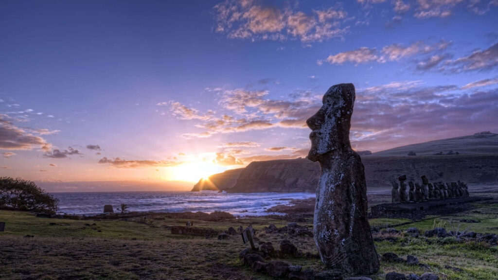 Stunning Moai Wallpaper with Vibrant Sunset and Sea Background