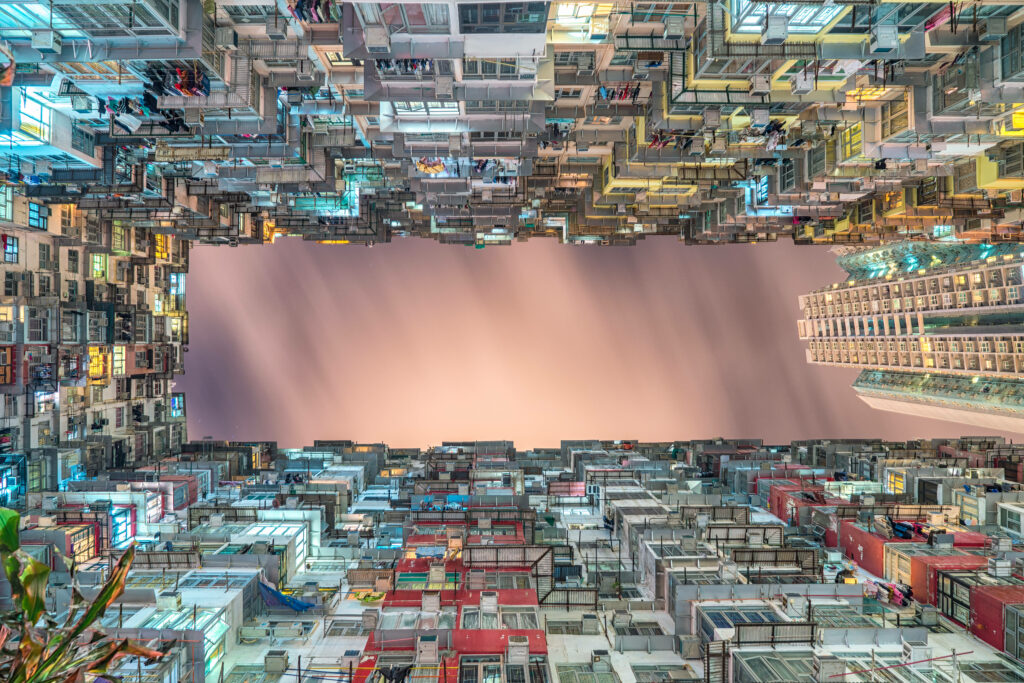 Stunning Wallpaper of Hong Kong's Iconic Monster Building at Dusk