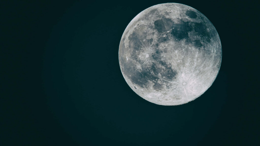 Stunning Moon Wallpaper: Serene Nighttime Scene Background