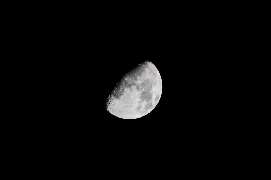 Serene Moon Wallpaper: Detailed Craters & Dark Space Background