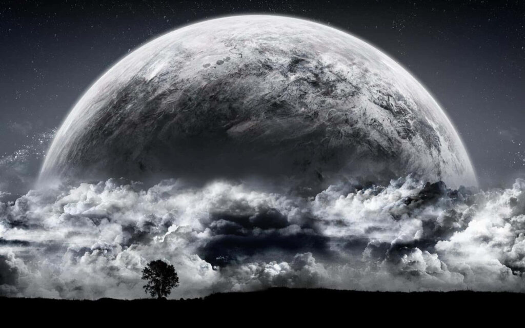 Stunning Moon Wallpaper: Dramatic Clouds & Tree Silhouette