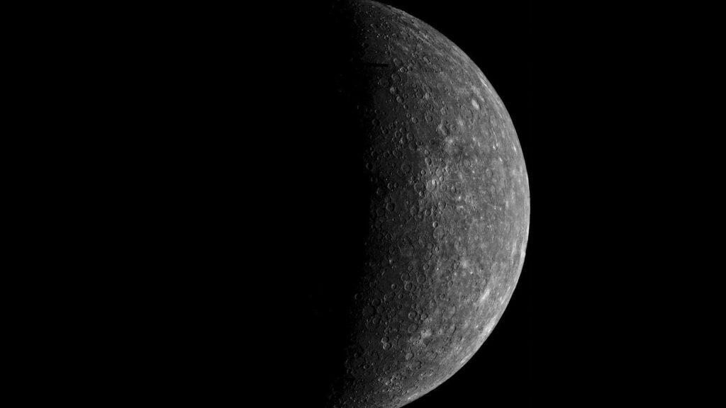 Stunning Moon Wallpaper: Rugged Craters & Celestial Shadows
