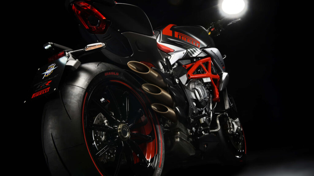 Sleek Red Motorcycle Wallpaper: Bold Design in Low-Light Adventure