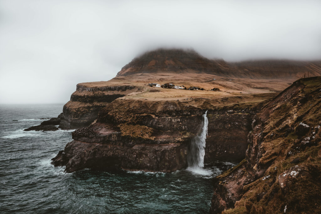 Mulafossur Waterfall Wallpaper: Breathtaking Faroe Islands Beauty