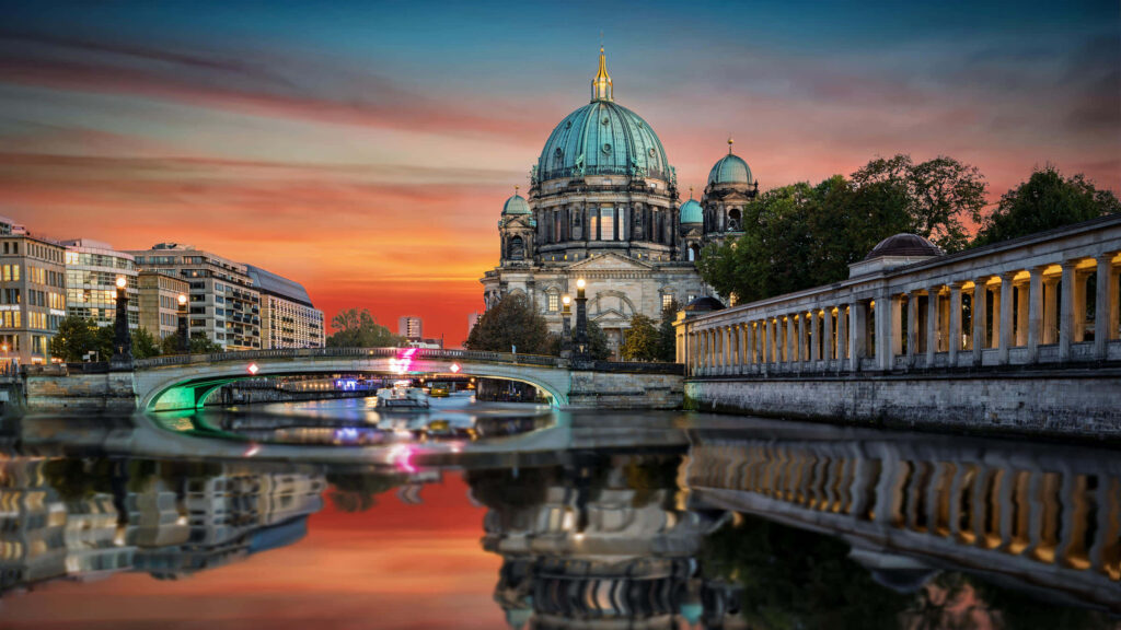 Stunning Museum Island Wallpaper: Dramatic Sunset & Vibrant Skies
