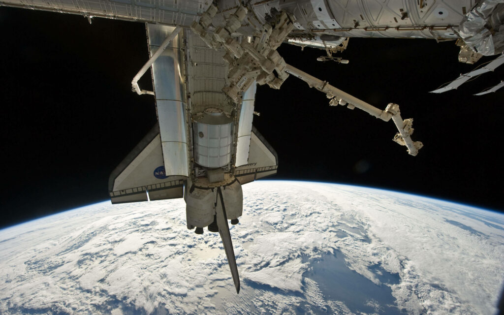 Stunning NASA Aesthetic Wallpaper: Satellite in Orbit with Earth View