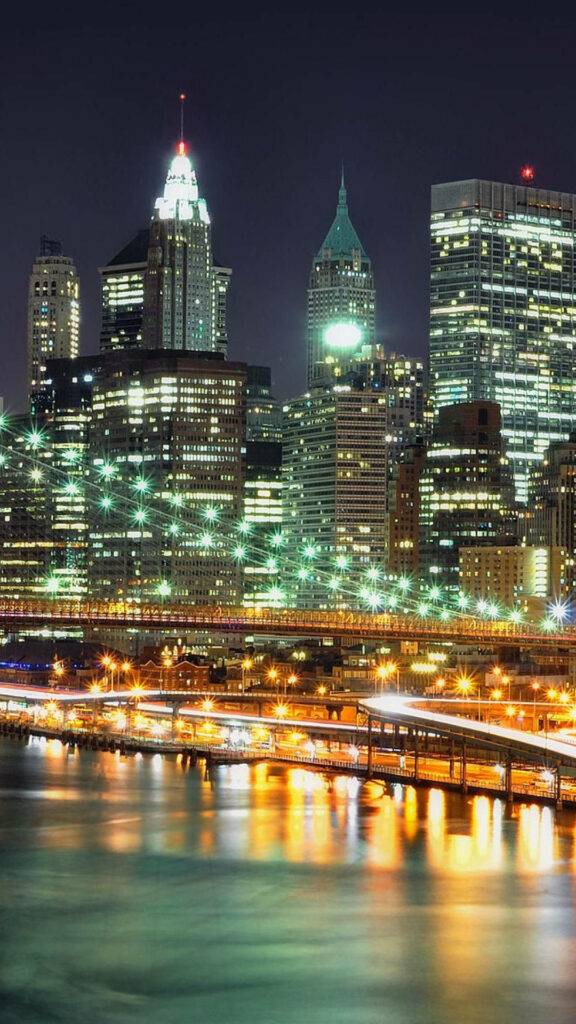 Stunning NYC Night View: Illuminated Bridge & Sparkling Skyscrapers Wallpaper